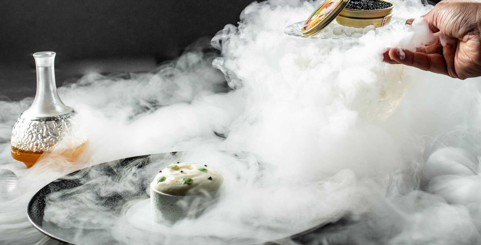 A signature plate at Restaurant Lalique — Brouillard du Ciron, yuzu and caviar, photographed by Michael Boudot.
